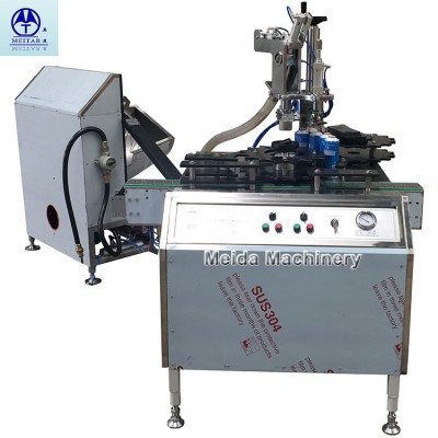 Automatic aerosol valve inserting machine